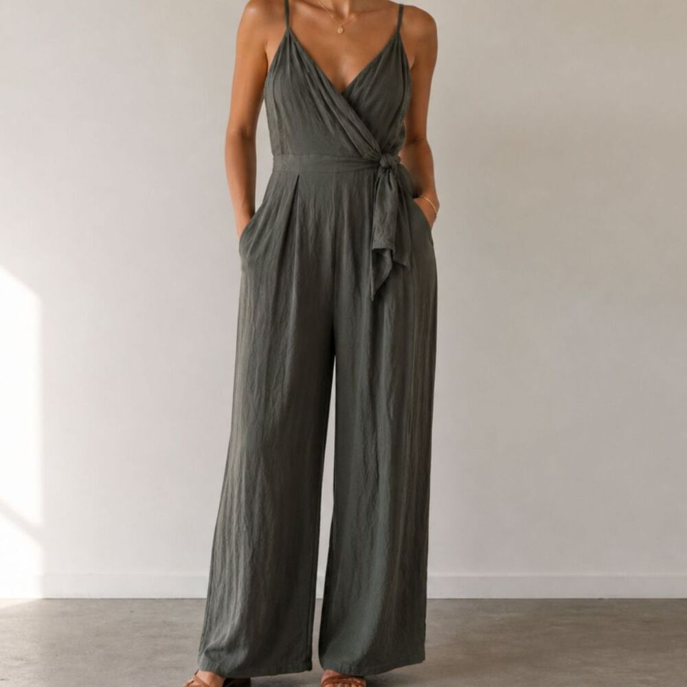 GB Olive geeen Jumpsuit sz Medium Spaghetti strap adjustable. V-cut,Plunging top